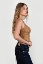 Side view showing halter tie and embroidered detail in Tan
