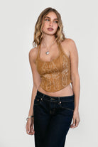 Woman wearing TIC TOC MARGEE Halter Top in Tan, front view with contrast embroidery