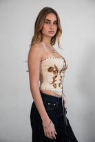 TIC TOC CLEMENTINE Stretch Embroidered Western Corset Top in khaki with halter tie, lace-up front, and studded detailing.