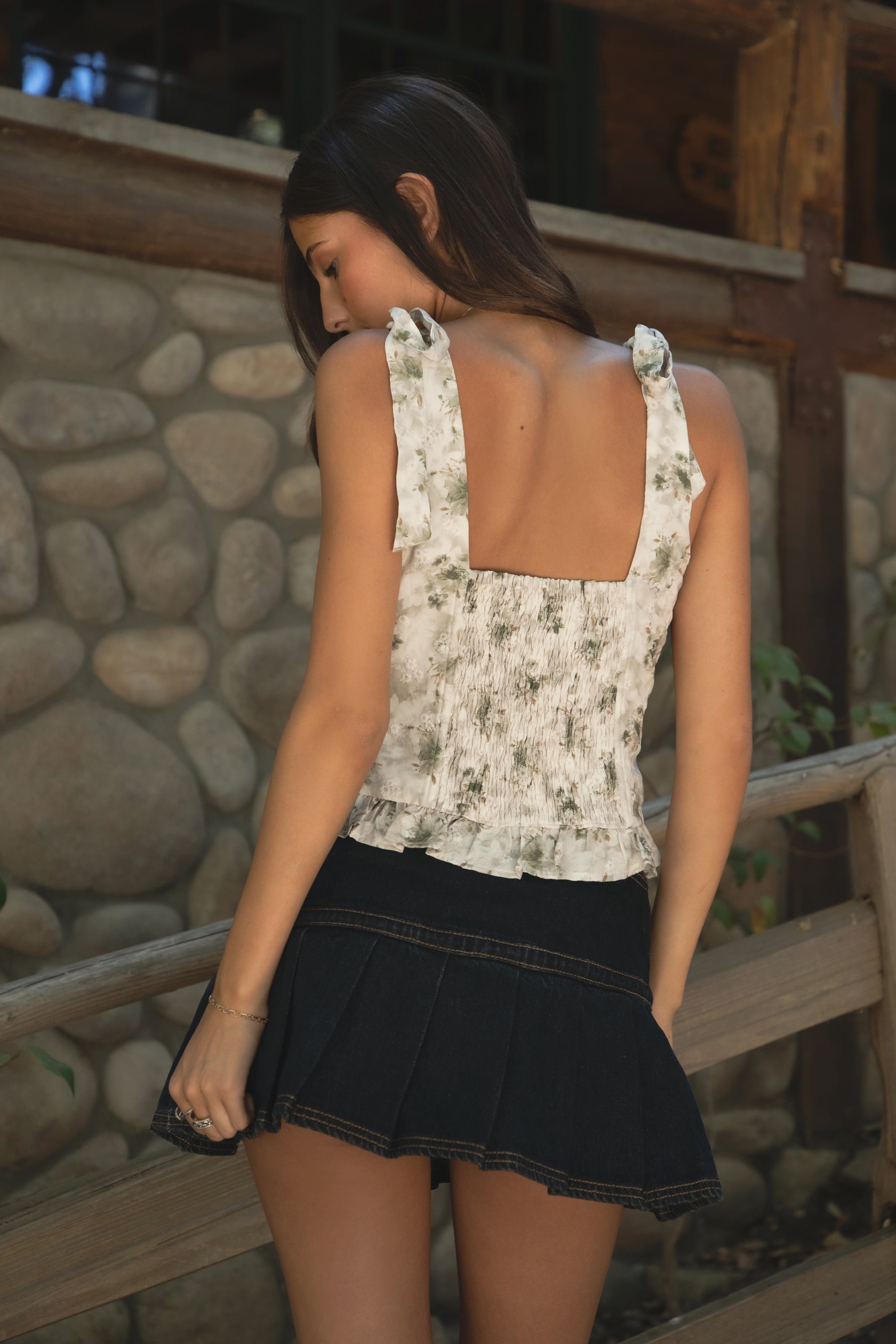 Back view of TIC TOC ROSALIEE Top — showcasing smocked panel and hidden zipper.