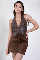TIC TOC TH30046 CARA Lightweight PU Halter Top in vegan leather. Features a deep V-neckline, halter straps, exposed lace front detail, and a low open back.