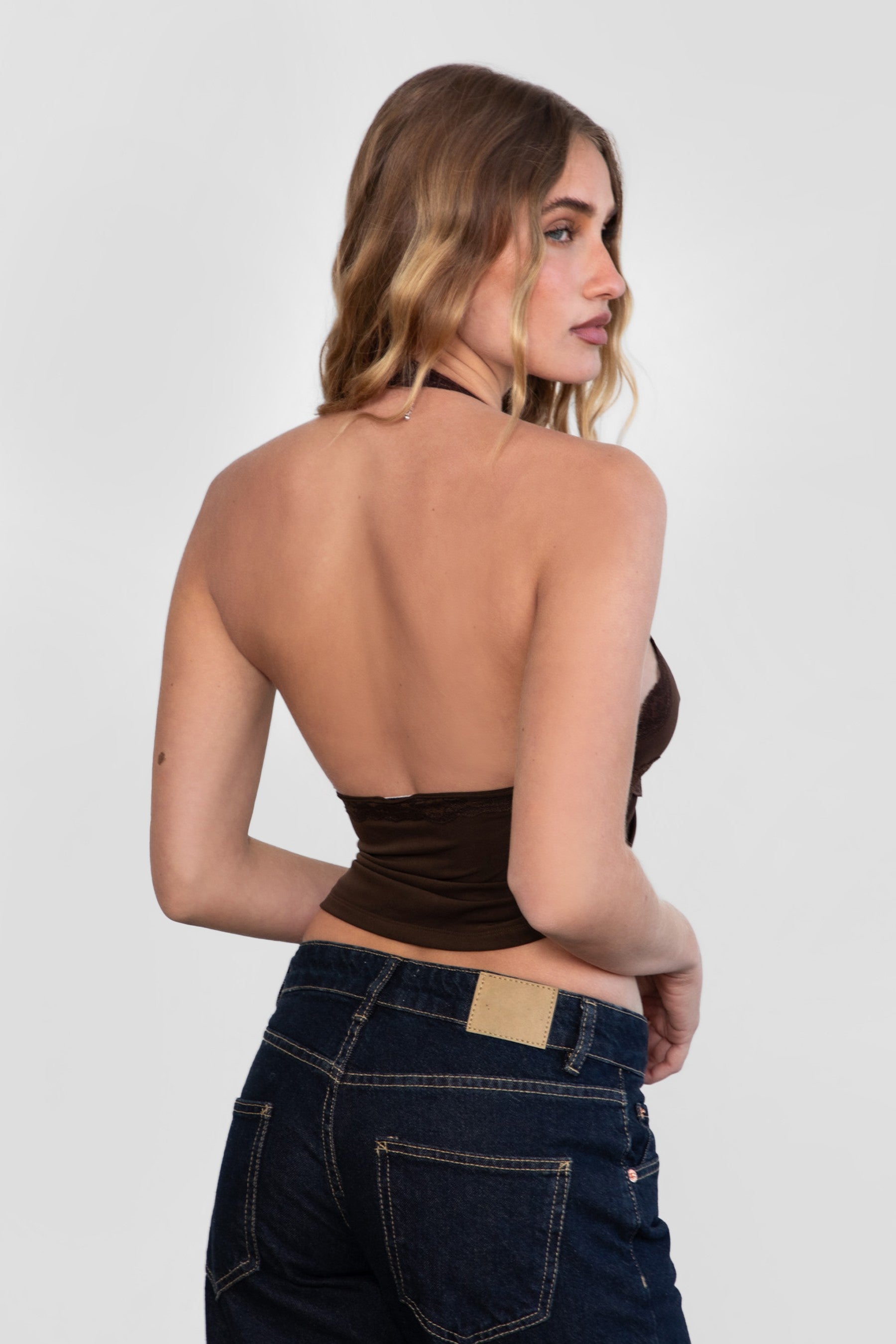 MILLIE Mesh Lace Halter Neck Top 
Fixed Halter Neckline 
Lace Trim Detail 
Double Lined Stretch Mesh Fabric 
90% POLYESTER 10% SPANDEX