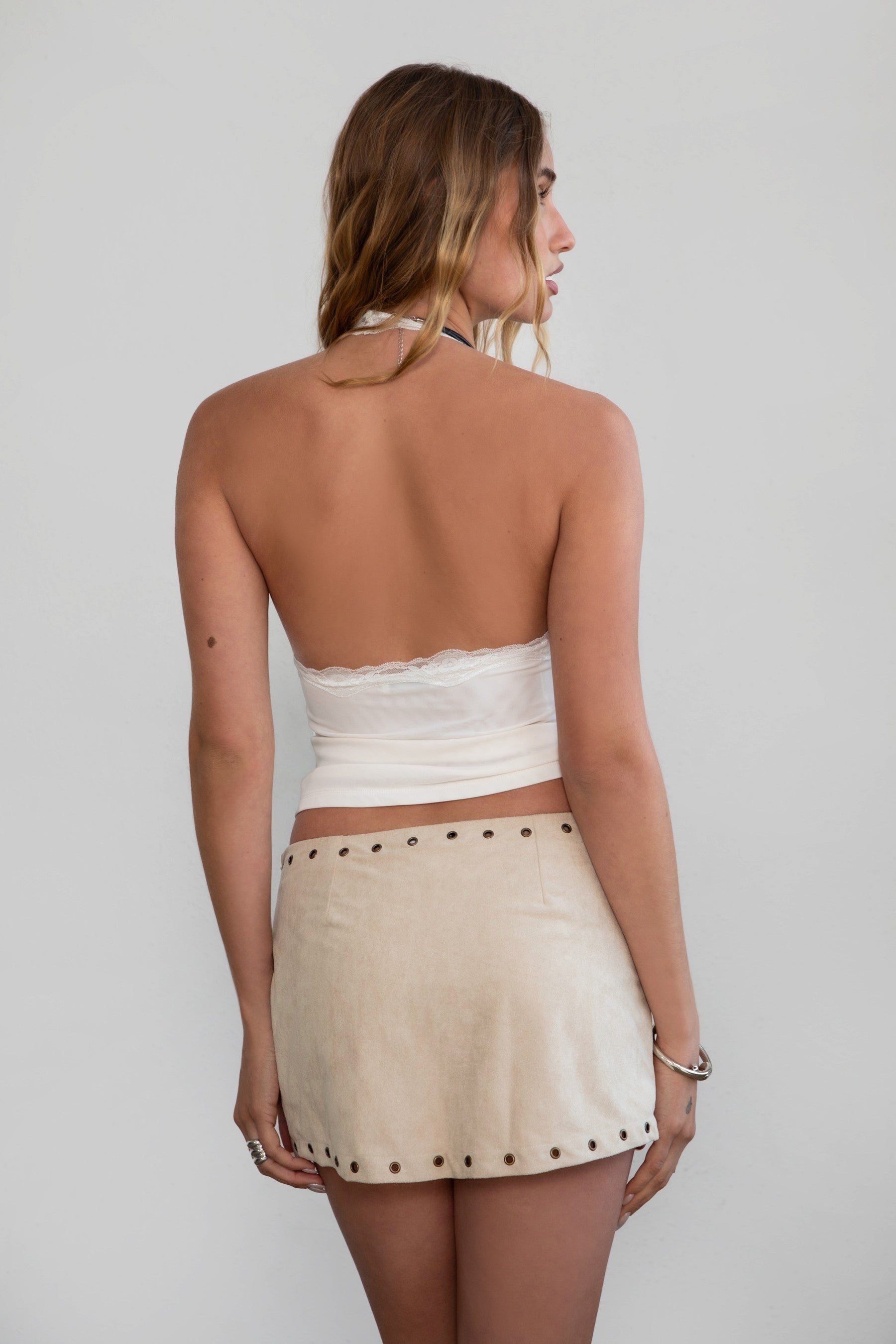 MILLIE Mesh Lace Halter Neck Top 
Fixed Halter Neckline 
Lace Trim Detail 
Double Lined Stretch Mesh Fabric 
90% POLYESTER 10% SPANDEX