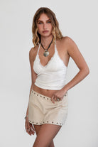 MILLIE Mesh Lace Halter Neck Top 
Fixed Halter Neckline 
Lace Trim Detail 
Double Lined Stretch Mesh Fabric 
90% POLYESTER 10% SPANDEX