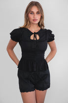 AGATHA Rayon Challis Keyhole Ruffle Blouse serves effortless romance with a soft, vintage feel.