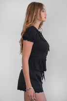 AGATHA Rayon Challis Keyhole Ruffle Blouse serves effortless romance with a soft, vintage feel.