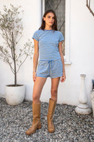 Woman wearing MARLOWE classic crewneck stripe short sleeve t-shirt featuring soft cotton blend fabric, lightweight comfortable feel, timeless striped pattern, classic crew neckline, short sleeves, relaxed slim fit, and effortless essential design for layering or everyday styling.