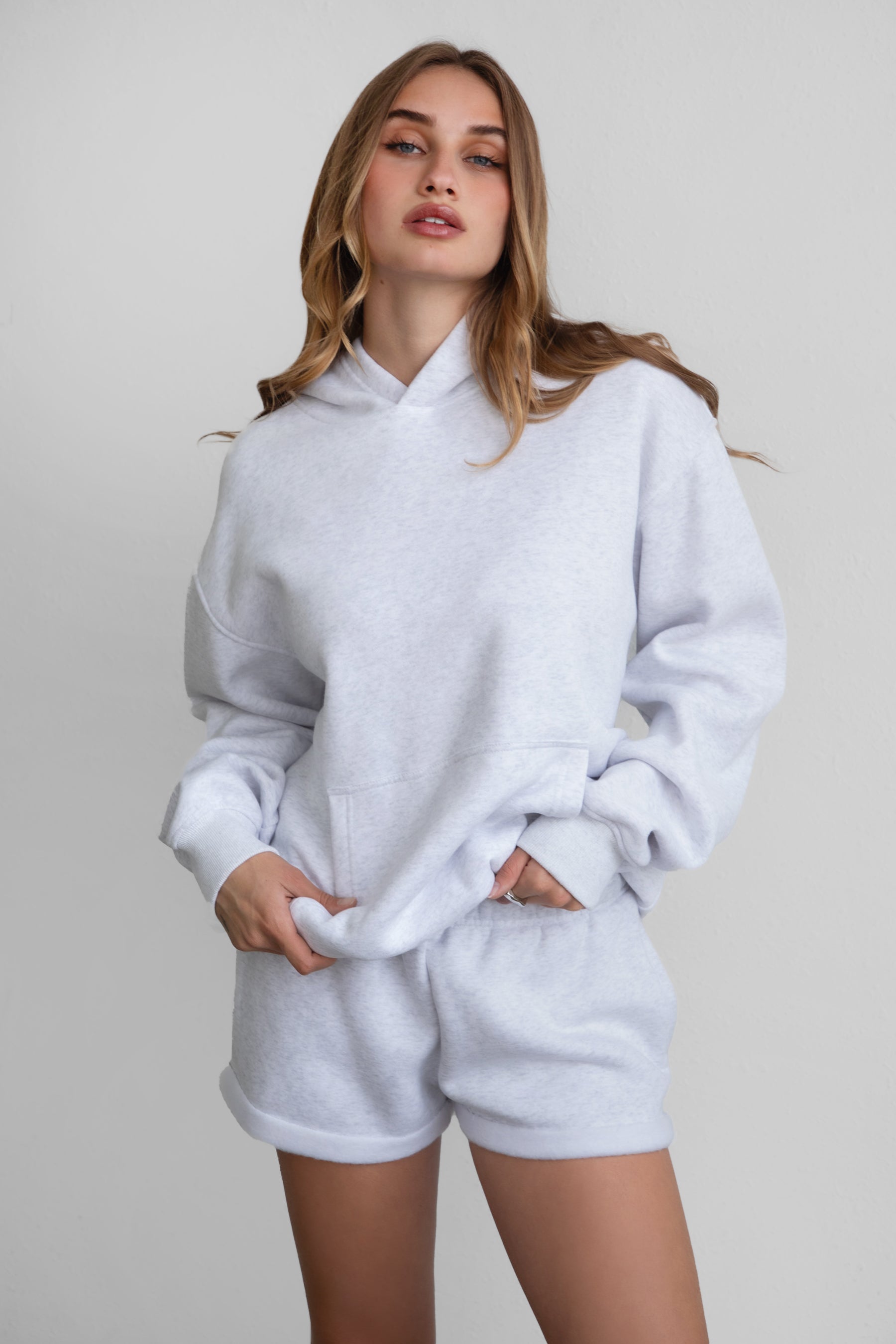 DAMI Cloud Fleece Classic Oversized Hoodie 
Extended Relaxed Fit 
Dropped Hem Shoulder
Kangaroo Pocket Design 
Thick Ribbed Cuffs and Bottom Hem 
Matching Shades to Cloud Fleece Collection

Cloud Fleece Key Features: 
Soft & Lightweight: Gentle on the skin with a breezy feel.
Midweight Warmth: Keeps you comfortable without overheating.
Drapey Design: Flows effortlessly for a flattering, laid-back look.