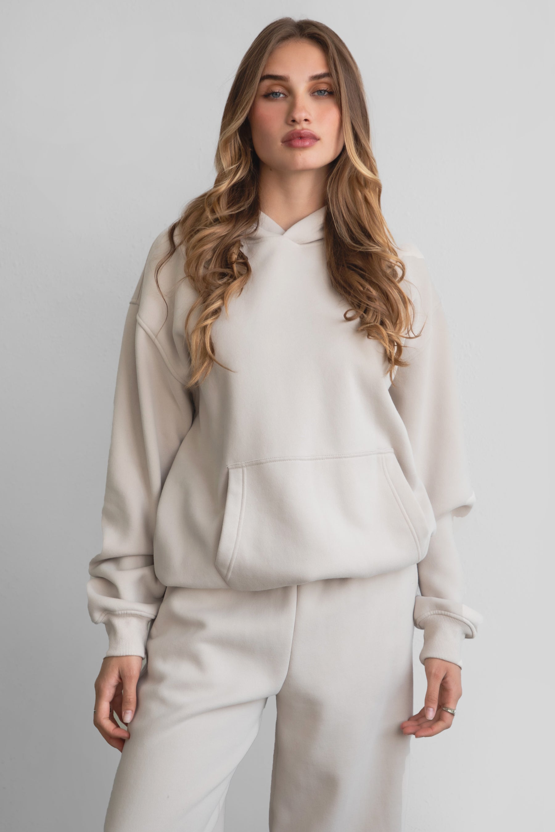 DAMI Cloud Fleece Classic Oversized Hoodie 
Extended Relaxed Fit 
Dropped Hem Shoulder
Kangaroo Pocket Design 
Thick Ribbed Cuffs and Bottom Hem 
Matching Shades to Cloud Fleece Collection

Cloud Fleece Key Features: 
Soft & Lightweight: Gentle on the skin with a breezy feel.
Midweight Warmth: Keeps you comfortable without overheating.
Drapey Design: Flows effortlessly for a flattering, laid-back look.