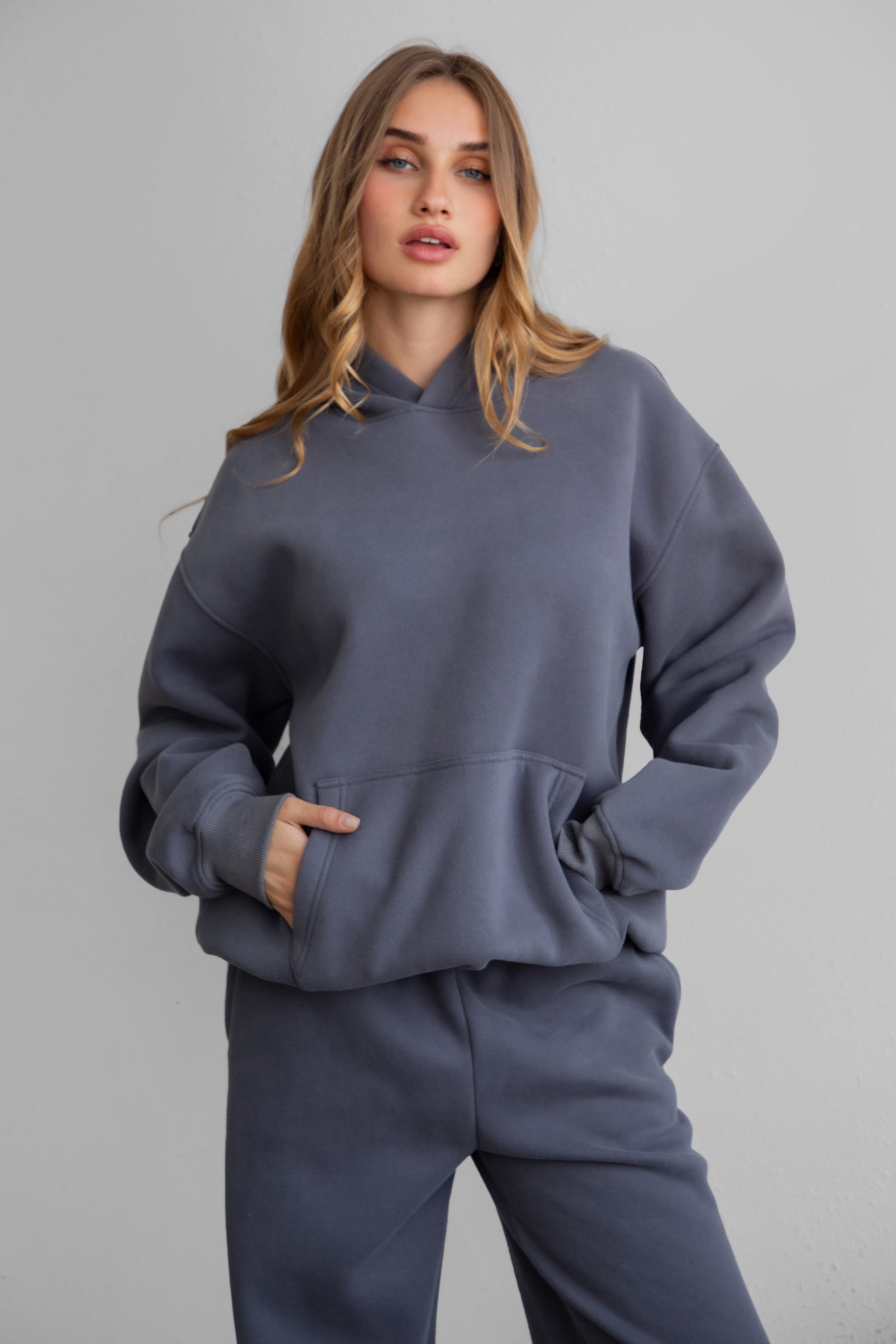 DAMI Cloud Fleece Classic Oversized Hoodie 
Extended Relaxed Fit 
Dropped Hem Shoulder
Kangaroo Pocket Design 
Thick Ribbed Cuffs and Bottom Hem 
Matching Shades to Cloud Fleece Collection

Cloud Fleece Key Features: 
Soft & Lightweight: Gentle on the skin with a breezy feel.
Midweight Warmth: Keeps you comfortable without overheating.
Drapey Design: Flows effortlessly for a flattering, laid-back look.
