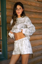 AVERY Light Woodland Camo Mid Rise Fleece Shorts 
Relaxed Straight Leg Lounge Fit
Elasticated Waistband 
Deep Reversible Side Pockets 
Light Forest Woodland Camo in Dusted Grey
Featured In Our New Cloud Fleece Fabric 
Back To School Western Rodeo Outfit Fashion Inspo

Cloud Fleece Key Features: 
Soft & Lightweight: Gentle on the skin with a breezy feel.
Midweight Warmth: Keeps you comfortable without overheating.
Drapey Design: Flows effortlessly for a flattering, laid-back look
