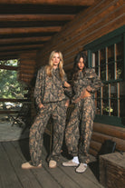 BAYOU Dark Woodland Camo Fleece Classic Oversized Hoodie 
Extended Relaxed Fit 
Dropped Hem Shoulder
Kangaroo Pocket Design 
Thick Ribbed Cuffs and Bottom Hem 
Dark Forest Woodland Camo
Featured In Our New Cloud Fleece Fabric 
Back To School Western Rodeo Outfit Fashion Inspo

Cloud Fleece Key Features: 
Soft & Lightweight: Gentle on the skin with a breezy feel.
Midweight Warmth: Keeps you comfortable without overheating.
Drapey Design: Flows effortlessly for a flattering, laid-back look.
