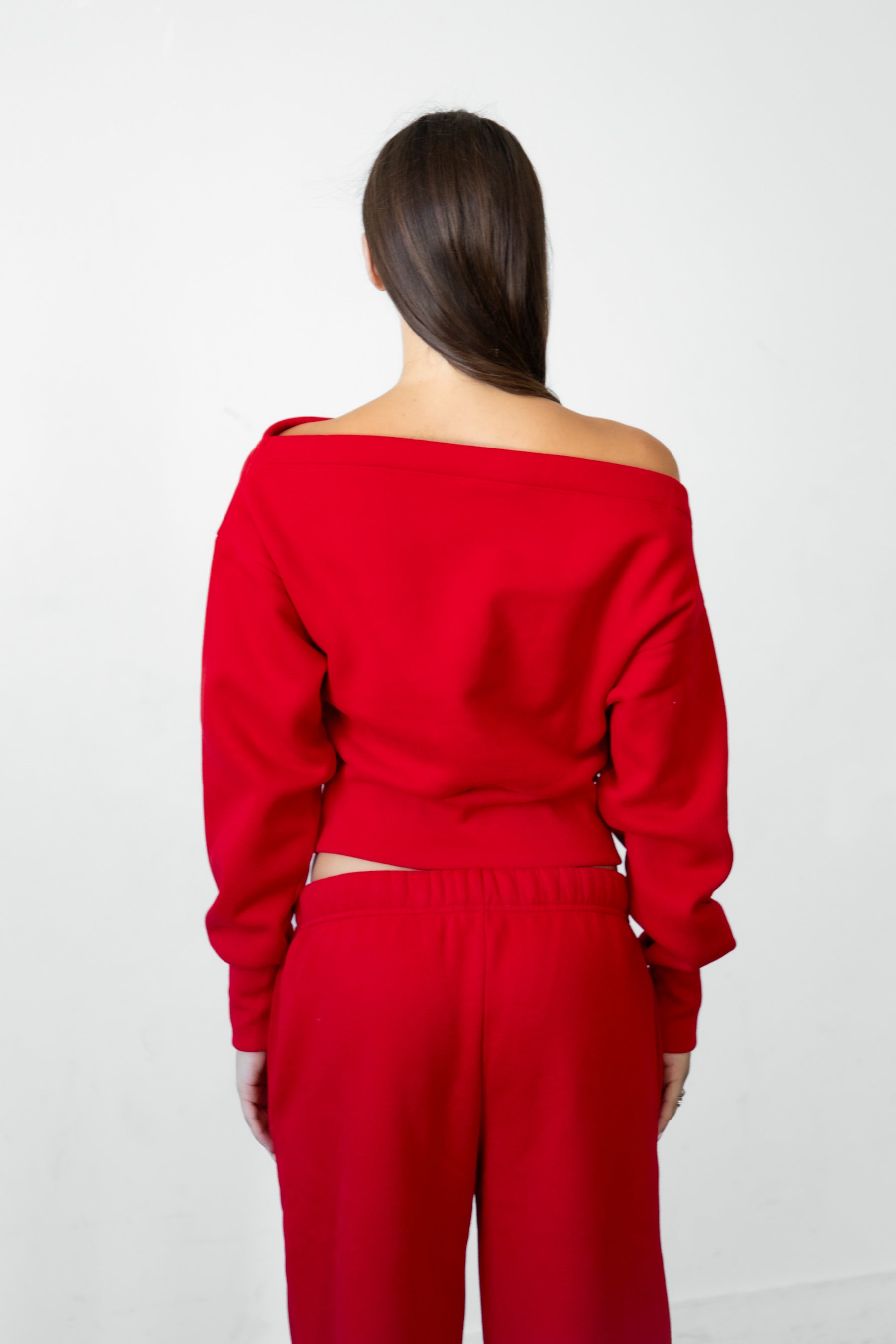 Woman wearing LANI mock neck cloud fleece sweatshirt featuring soft cotton blend cloud fleece fabric, ribbed mock neckline, relaxed oversized fit, dropped shoulder design, long sleeves with ribbed cuffs, triangle stitch detail at center front, and ribbed hem for a cozy comfortable finish.