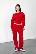 Woman wearing LANI mock neck cloud fleece sweatshirt featuring soft cotton blend cloud fleece fabric, ribbed mock neckline, relaxed oversized fit, dropped shoulder design, long sleeves with ribbed cuffs, triangle stitch detail at center front, and ribbed hem for a cozy comfortable finish.