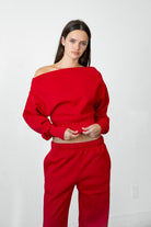 Woman wearing LANI mock neck cloud fleece sweatshirt featuring soft cotton blend cloud fleece fabric, ribbed mock neckline, relaxed oversized fit, dropped shoulder design, long sleeves with ribbed cuffs, triangle stitch detail at center front, and ribbed hem for a cozy comfortable finish.