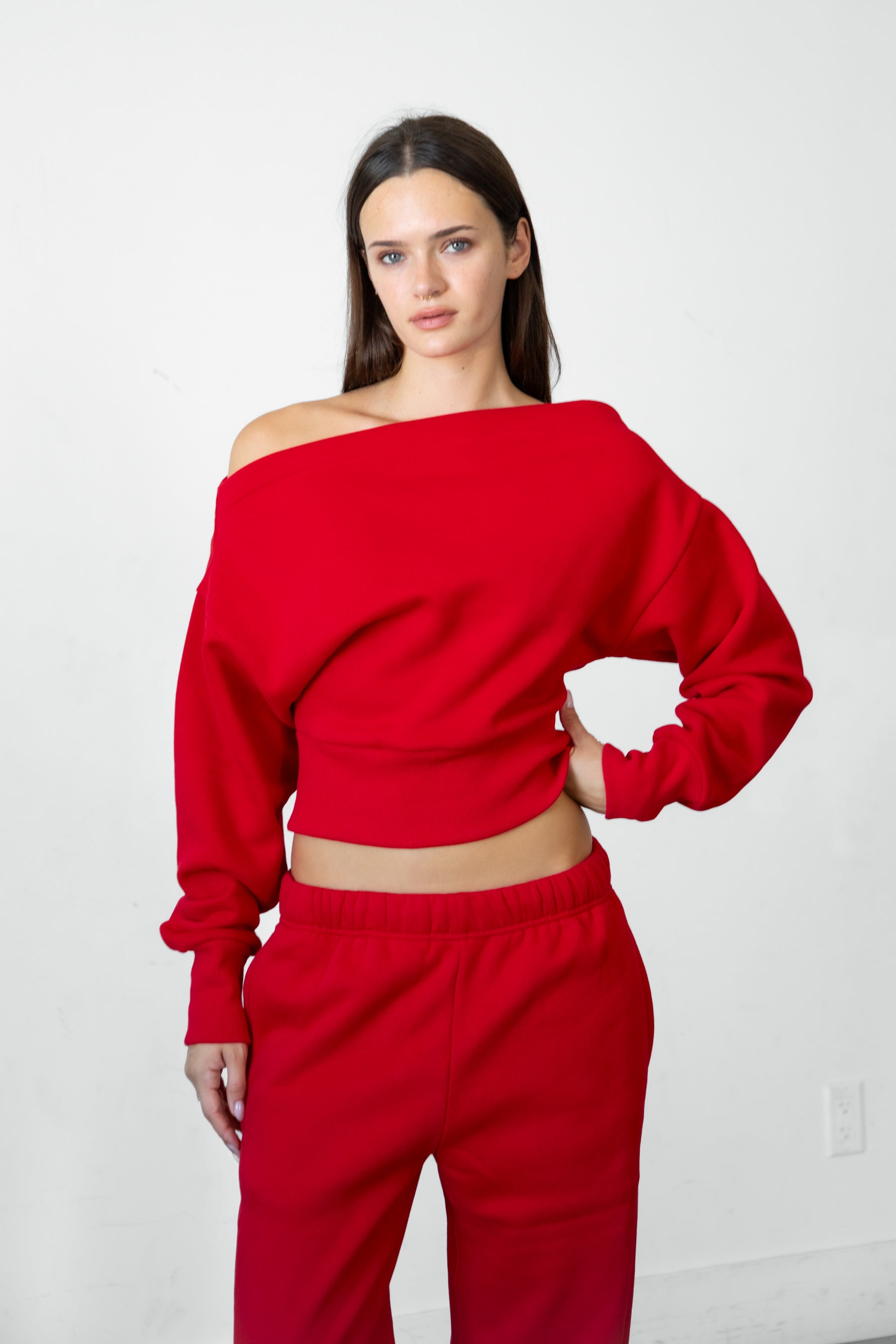 Woman wearing LANI mock neck cloud fleece sweatshirt featuring soft cotton blend cloud fleece fabric, ribbed mock neckline, relaxed oversized fit, dropped shoulder design, long sleeves with ribbed cuffs, triangle stitch detail at center front, and ribbed hem for a cozy comfortable finish.