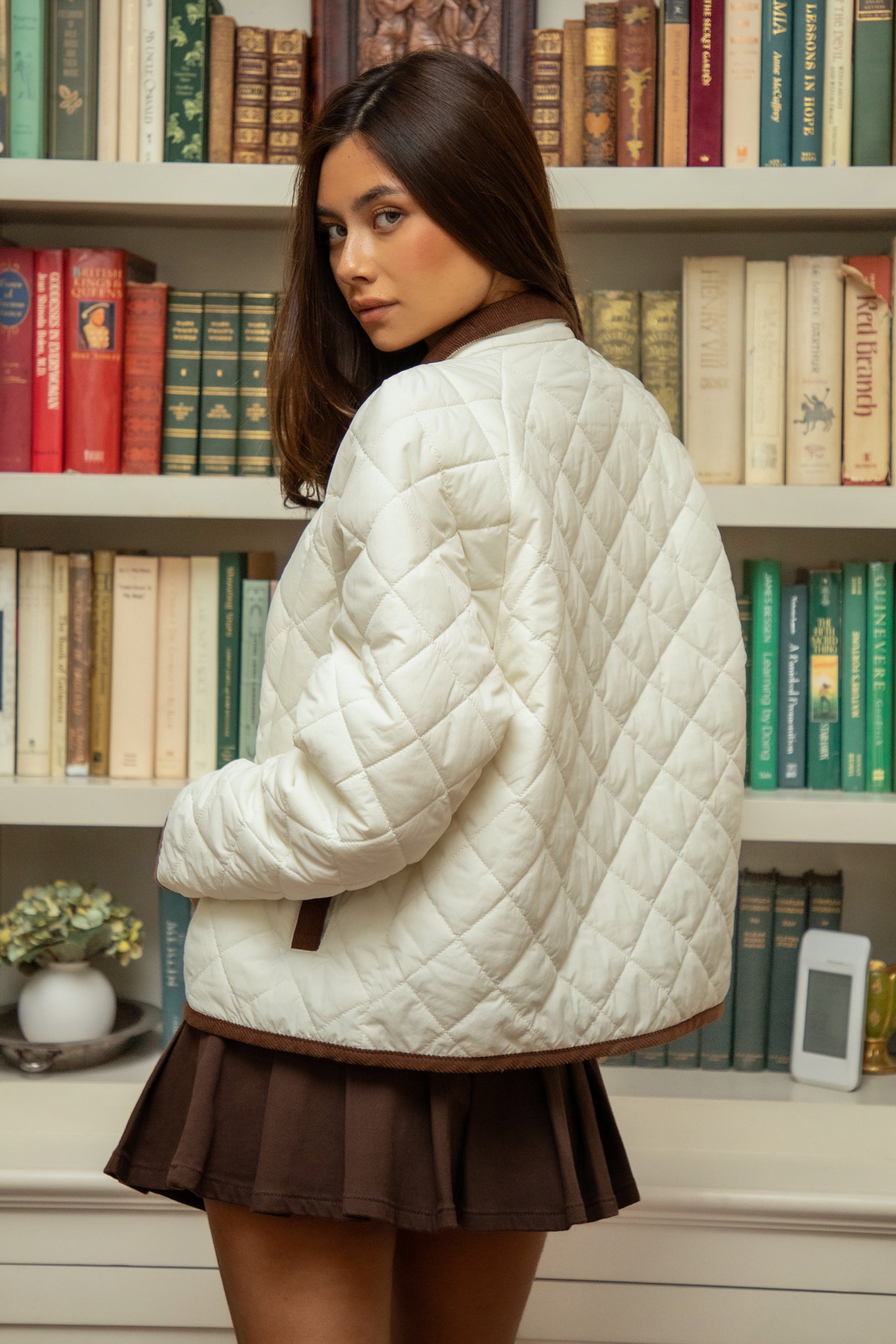 Woman wearing TIC TOC TT31860-SORELL SORELL quilted contrast collar jacket featuring allover diamond quilted stitching, front snap button closure, contrast corduroy collar and trim, two front patch pockets, and a soft rounded hemline in a cozy semi oversized fit, styled over casual basics for an easy campus-ready fall layering look.
