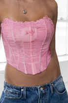 Mauve strapless mesh bustier featuring boned bodice and asymmetrical hem