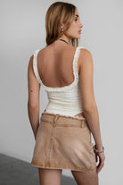 Sexy cream lace bodysuit with low V neckline and exposed underbust detail