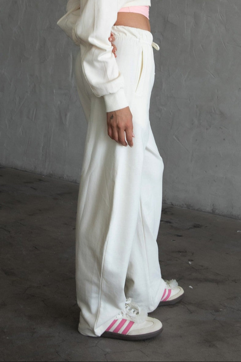Barrel fit jogger pants with adjustable drawcord and deep side pockets by TIC TOC