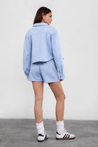 TIC TOC JENNIE cropped fleece shacket in baby blue with button-up front and front pocket detail
