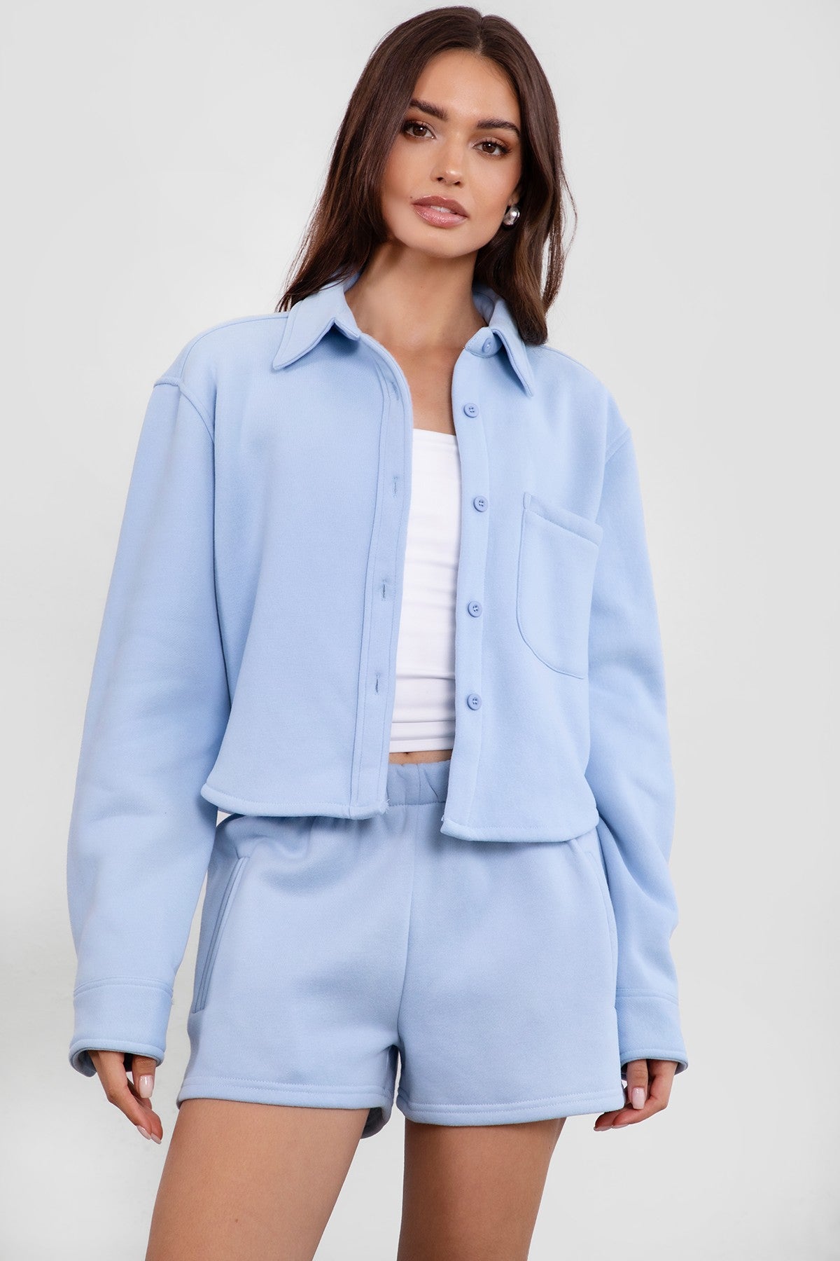 TIC TOC JENNIE cropped fleece shacket in baby blue with button-up front and front pocket detail