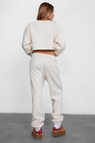 TIC TOC DOVE high waist fleece sweatpants in ECRU with elasticated waistband and side pockets