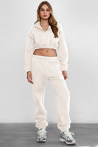 Game-day ready high-waist sweatpants in blush from the Essentials Plush Fleece Collection in ecru