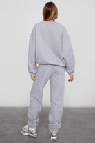 Game-day ready high-waist sweatpants in blush from the Essentials Plush Fleece Collection in heather grey