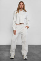 Game-day ready high-waist sweatpants in blush from the Essentials Plush Fleece Collection in heather white