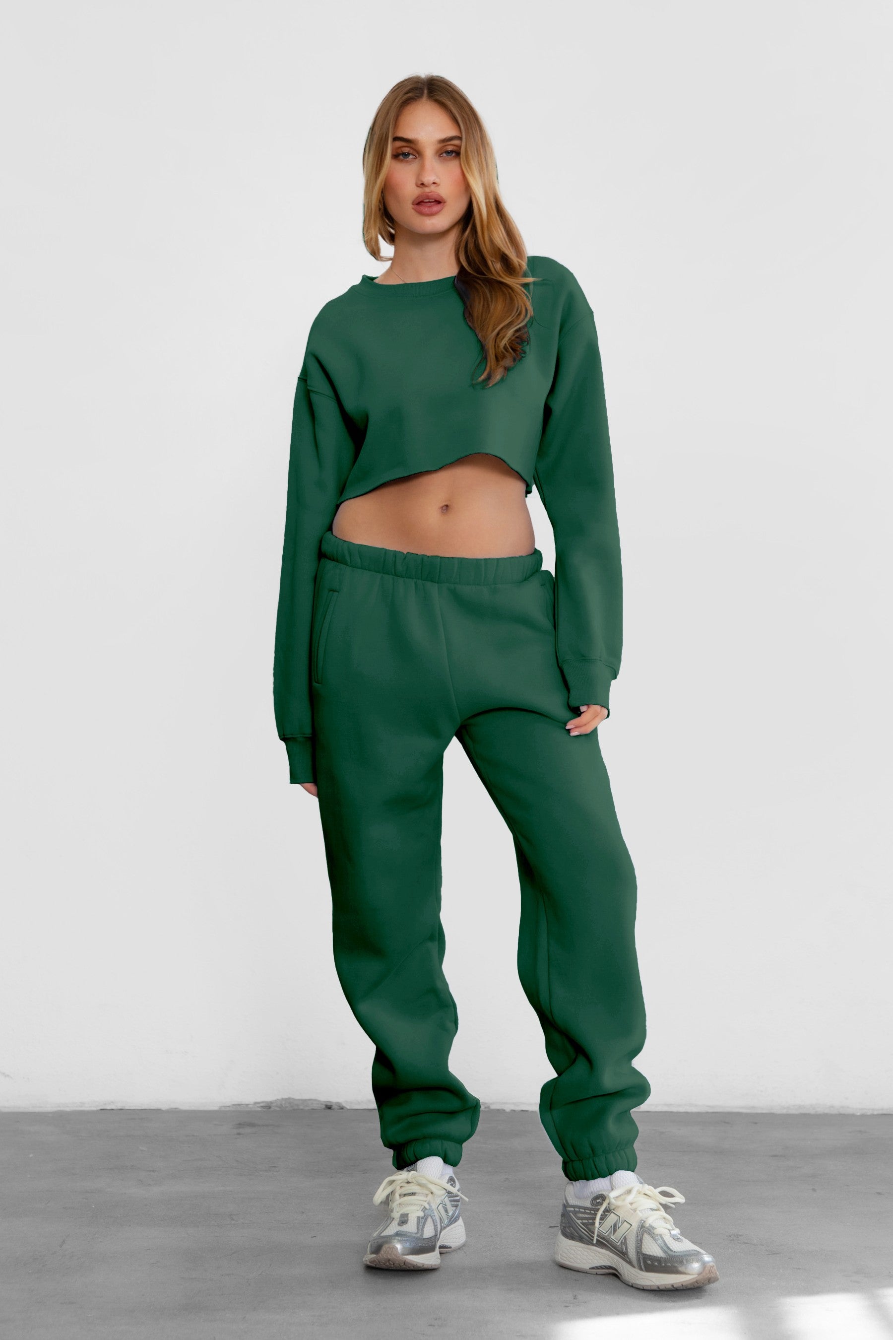 Game-day ready high-waist sweatpants in blush from the Essentials Plush Fleece Collection in hunter green 