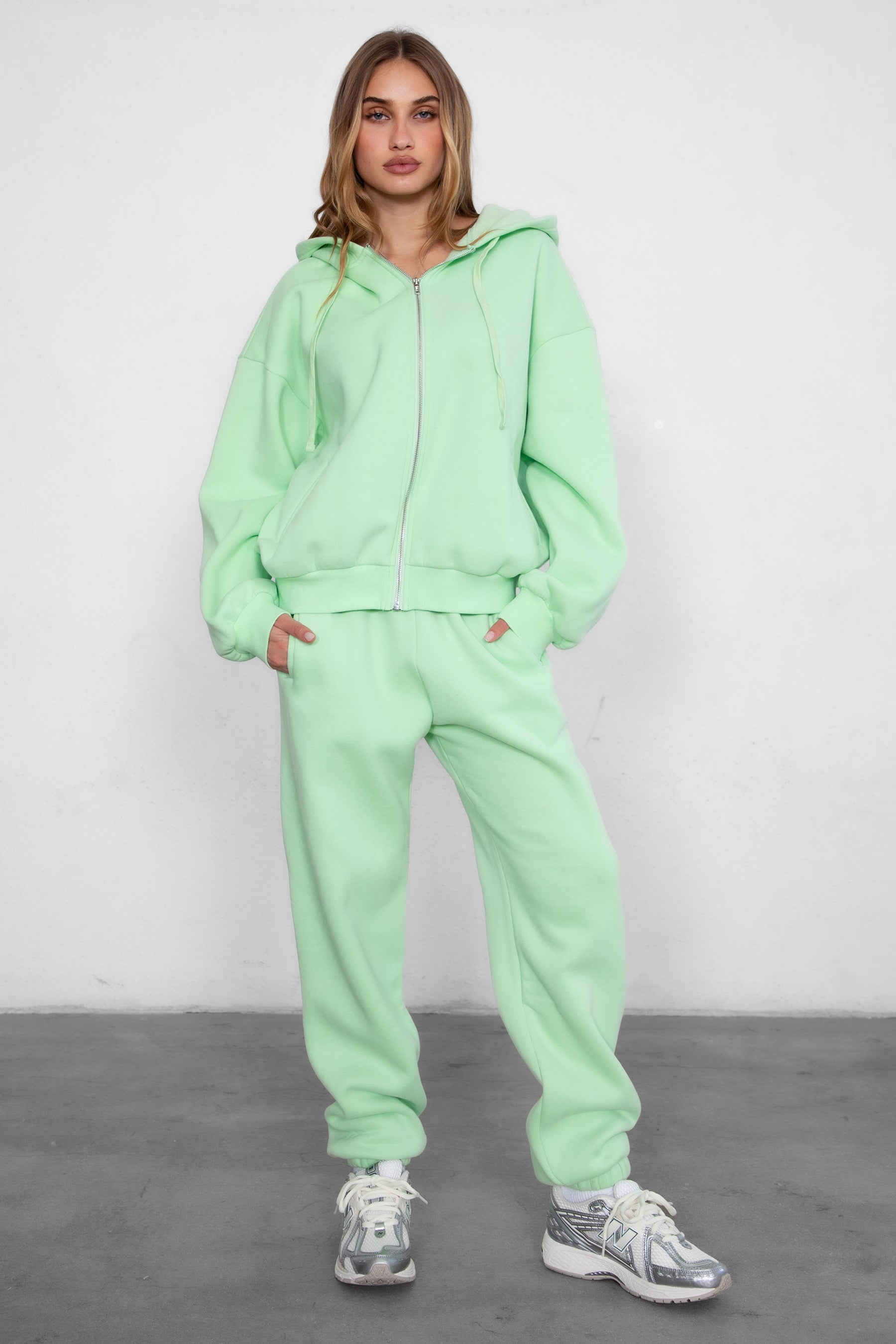 Game-day ready high-waist sweatpants in blush from the Essentials Plush Fleece Collection in pastel lime