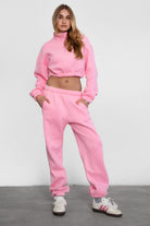 Game-day ready high-waist sweatpants in blush from the Essentials Plush Fleece Collection in pink