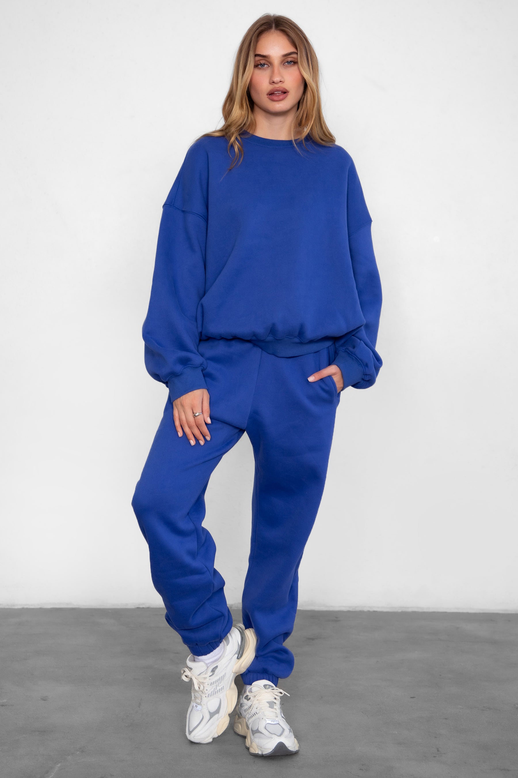 Game-day ready high-waist sweatpants in blush from the Essentials Plush Fleece Collection in royal blue