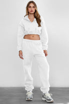Game-day ready high-waist sweatpants in blush from the Essentials Plush Fleece Collection in white